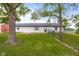 Expansive backyard with mature trees and a charming fence at 4605 S 150 W, Columbus, IN 47201