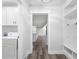 Hallway showing mudroom, laundry, and kitchen views at 4605 S 150 W, Columbus, IN 47201