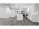 Open concept kitchen and living area with eat-in island with barstool seating at 4605 S 150 W, Columbus, IN 47201