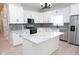 Modern kitchen featuring granite countertops, stainless steel appliances, and white cabinetry at 4625 W Naomi St, Indianapolis, IN 46241