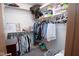 Walk-in closet with shelving and hanging racks, offering ample storage space for clothes and accessories at 540 Cahill Ln, Indianapolis, IN 46214