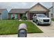 Charming brick home with manicured lawn, attached garage, and decorative shutters at 540 Cahill Ln, Indianapolis, IN 46214