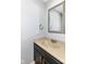 Bathroom with a modern vanity and a large framed mirror at 558 E Vermont St, Indianapolis, IN 46202