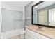 Bathroom featuring shower, vanity, and neutral countertops at 558 E Vermont St, Indianapolis, IN 46202