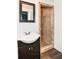 Bathroom with a walk-in shower and vanity at 558 E Vermont St, Indianapolis, IN 46202