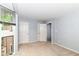 Neutral carpet in this bedroom with two entries and view of courtyard at 558 E Vermont St, Indianapolis, IN 46202