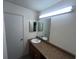 Bright bathroom featuring single sink vanity with ample counter space and neutral color palette at 5711 Bradston Way, Indianapolis, IN 46237