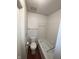 Clean bathroom featuring a white toilet, tiled shower with bathtub and hardwood flooring at 5711 Bradston Way, Indianapolis, IN 46237