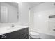 Clean bathroom with modern vanity and shower-tub combination at 6011 Twyckenham Dr, Indianapolis, IN 46236
