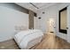 Bright bedroom flows into ensuite bathroom at 611 N Park Ave # 108, Indianapolis, IN 46204