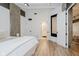 Bright bedroom flows into ensuite bathroom and sitting area at 611 N Park Ave # 108, Indianapolis, IN 46204