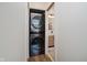 Convenient, in-unit stacked washer and dryer with adjacent bathroom at 611 N Park Ave # 108, Indianapolis, IN 46204