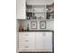 Stylish bar area with custom cabinets, countertops, and ample storage for beverages and glassware at 628 Tess Blvd, Westfield, IN 46074