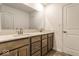 Bathroom with double sink, vanity, large mirror, and a door at 628 Tess Blvd, Westfield, IN 46074