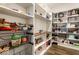 Walk-in pantry with ample shelving, storage baskets, and plenty of space for food items at 628 Tess Blvd, Westfield, IN 46074