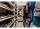 Well-organized walk-in closet featuring ample shelving and hanging space at 628 Tess Blvd, Westfield, IN 46074