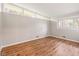 Empty bedroom with laminate wood floors, and modern clerestory windows at 650 W Main St, Carmel, IN 46032
