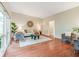 Bright living room features wood floors, neutral walls and modern decor at 650 W Main St, Carmel, IN 46032