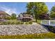 The sprawling backyard and private dock offer fantastic views of the lake and a beautiful home at 719 E New Rd, Greenfield, IN 46140