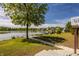 From the yard, enjoy expansive lake views, a private dock, and a well-maintained lawn at 719 E New Rd, Greenfield, IN 46140