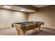 Spacious finished basement with plush carpeting, a pool table, and recessed lighting at 719 E New Rd, Greenfield, IN 46140