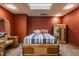 This finished basement bedroom offers neutral carpeting and a large mirror at 719 E New Rd, Greenfield, IN 46140