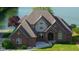 Charming brick two-story home features a well-maintained lawn and stunning waterfront views, ideal for serene lakeside living at 719 E New Rd, Greenfield, IN 46140