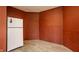 Spacious pantry space, featuring light wood flooring and a white refrigerator at 719 E New Rd, Greenfield, IN 46140