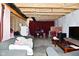 Spacious unfinished basement with exposed ceiling, offering potential for customization and additional living space at 7515 Brattle Dr, Indianapolis, IN 46113