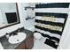Charming bathroom featuring a unique 'Hello Beautiful' shower curtain and modern vanity at 7515 Brattle Dr, Indianapolis, IN 46113