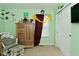 Cozy bedroom features playful decor and good natural lighting at 7515 Brattle Dr, Indianapolis, IN 46113