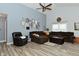 Inviting living room with vaulted ceiling, ceiling fan, and ample space for a relaxing atmosphere at 7515 Brattle Dr, Indianapolis, IN 46113