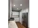 Galley kitchen features modern appliances and ample counter space at 7548 Briarstone Dr, Indianapolis, IN 46227