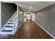 Open living area featuring stairway that goes straight to a kitchen at 7548 Briarstone Dr, Indianapolis, IN 46227