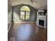 Bright living room with fireplace and large window at 7548 Briarstone Dr, Indianapolis, IN 46227