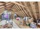 Unfinished attic space with exposed beams and an abundance of storage at 790 Foxboro Dr, Avon, IN 46123