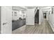 Finished basement with durable floors, open access to an exercise area, and a staircase leading to the upper level at 790 Foxboro Dr, Avon, IN 46123