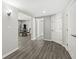 Open basement area with durable floors, dining table, multiple doorways, and neutral color palette at 790 Foxboro Dr, Avon, IN 46123