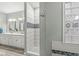 Bright bathroom featuring walk-in shower, dual sinks, and stylish fixtures at 790 Foxboro Dr, Avon, IN 46123