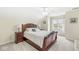 Bedroom offers a window with natural light and ceiling fan at 790 Foxboro Dr, Avon, IN 46123