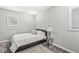 This cozy bedroom features a plush rug and two windows for natural light at 790 Foxboro Dr, Avon, IN 46123