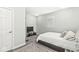 View of simple bedroom with TV on stand, carpet and neutral paint color at 790 Foxboro Dr, Avon, IN 46123