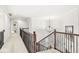 Bright second floor hallway with carpet, crown molding and chandelier at 790 Foxboro Dr, Avon, IN 46123