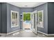 Mudroom with a view of the backyard pool and an opened door providing access at 790 Foxboro Dr, Avon, IN 46123