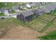 Aerial shot of backyard, highlighting fenced yard with green space at 808 Capricorn Dr, Franklin, IN 46131