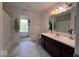 Bathroom featuring tile floors, a single sink vanity, and a shower/tub combo at 808 Capricorn Dr, Franklin, IN 46131