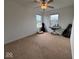 Neutral carpeted bedroom with natural light; ideal for music or hobbies with space for instruments at 808 Capricorn Dr, Franklin, IN 46131