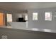 Bright hallway with natural light, crisp white walls, and open sightlines throughout the home at 808 Capricorn Dr, Franklin, IN 46131