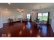 Open-concept living space featuring hardwood floors, recessed lighting, and comfortable seating at 808 Capricorn Dr, Franklin, IN 46131
