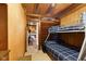 Bedroom showcasing bunk beds and natural light, perfect for accommodating multiple guests or Gathering members at 8434 S Christian Dr, Nineveh, IN 46164